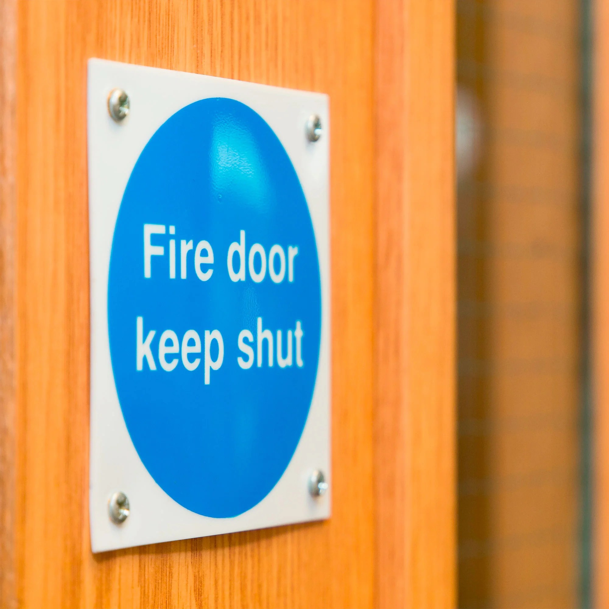 HOW DO FIRE DOORS WORK AND WHAT ARE THE BENEFITS? firedoorrange
