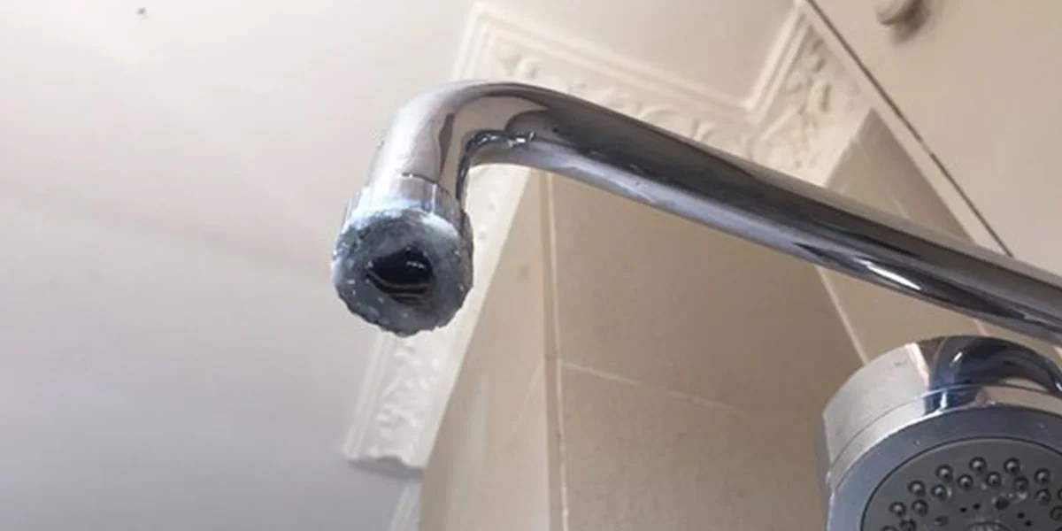 How to Remove A Shower Head That Is Glued On?
