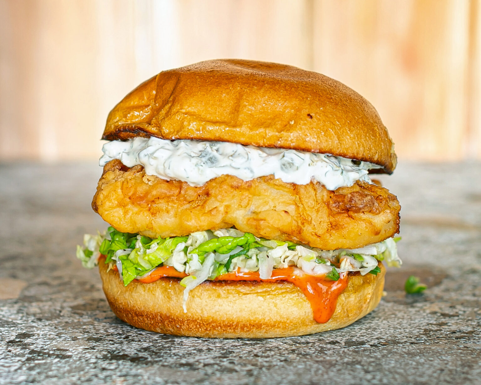 Fish Banger Burger Sour Cream Tartar and Sriracha Sauce
