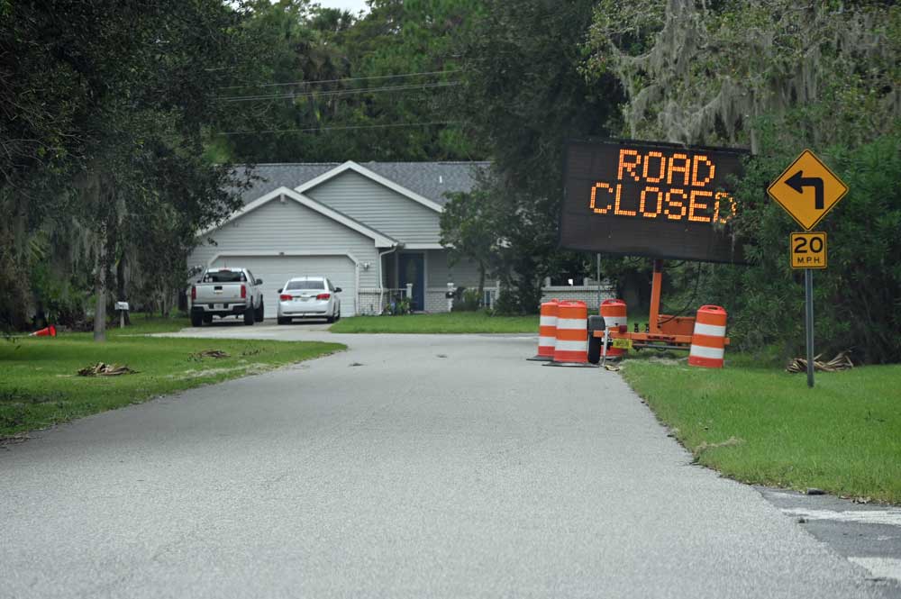 In Palm Coast's Woodlands, Water Is Still Rising and Sandbags Are Being