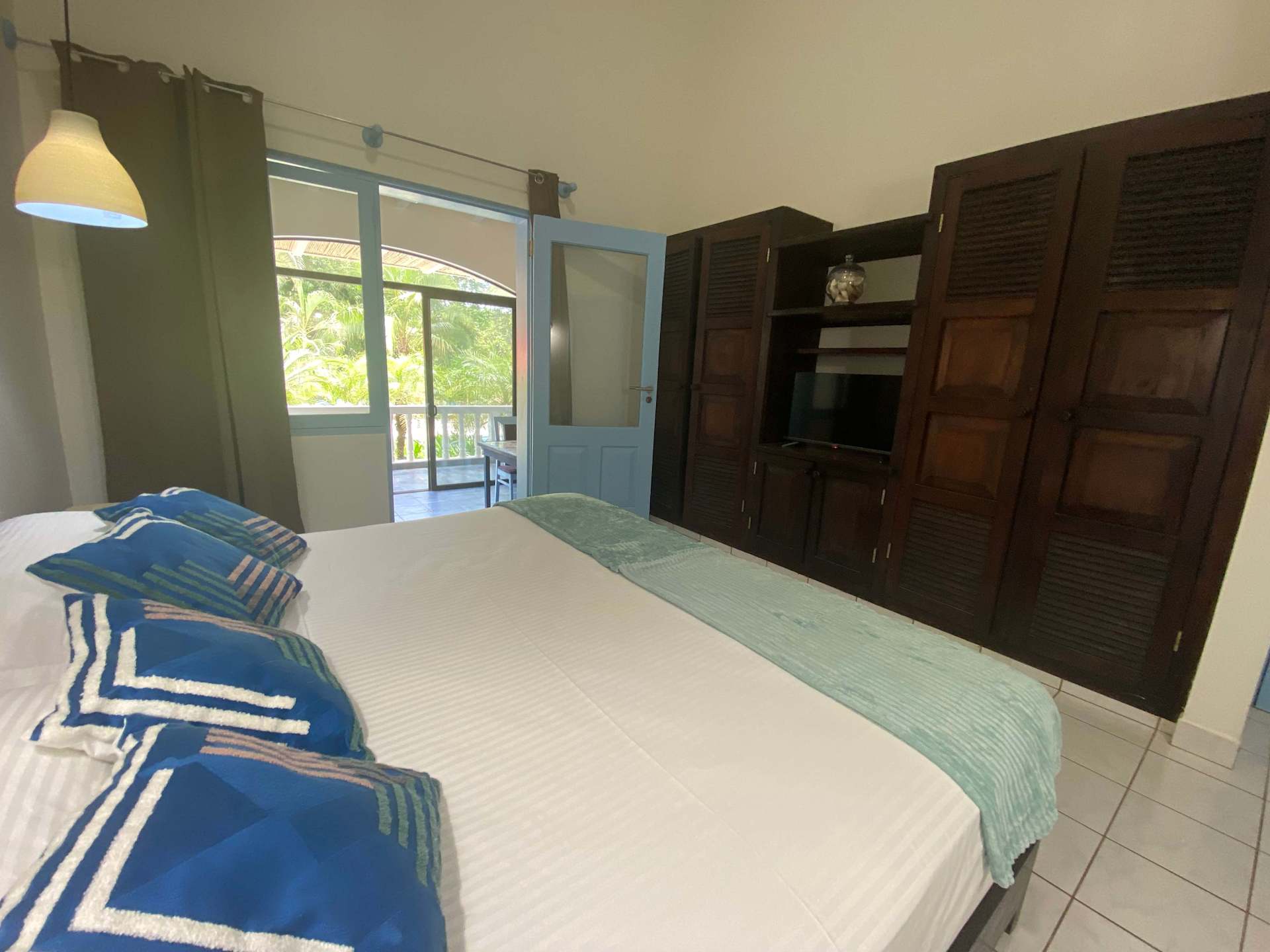 Manta Ray Lodge Flamingo Beach Realty Real Estate for Sale or Rent