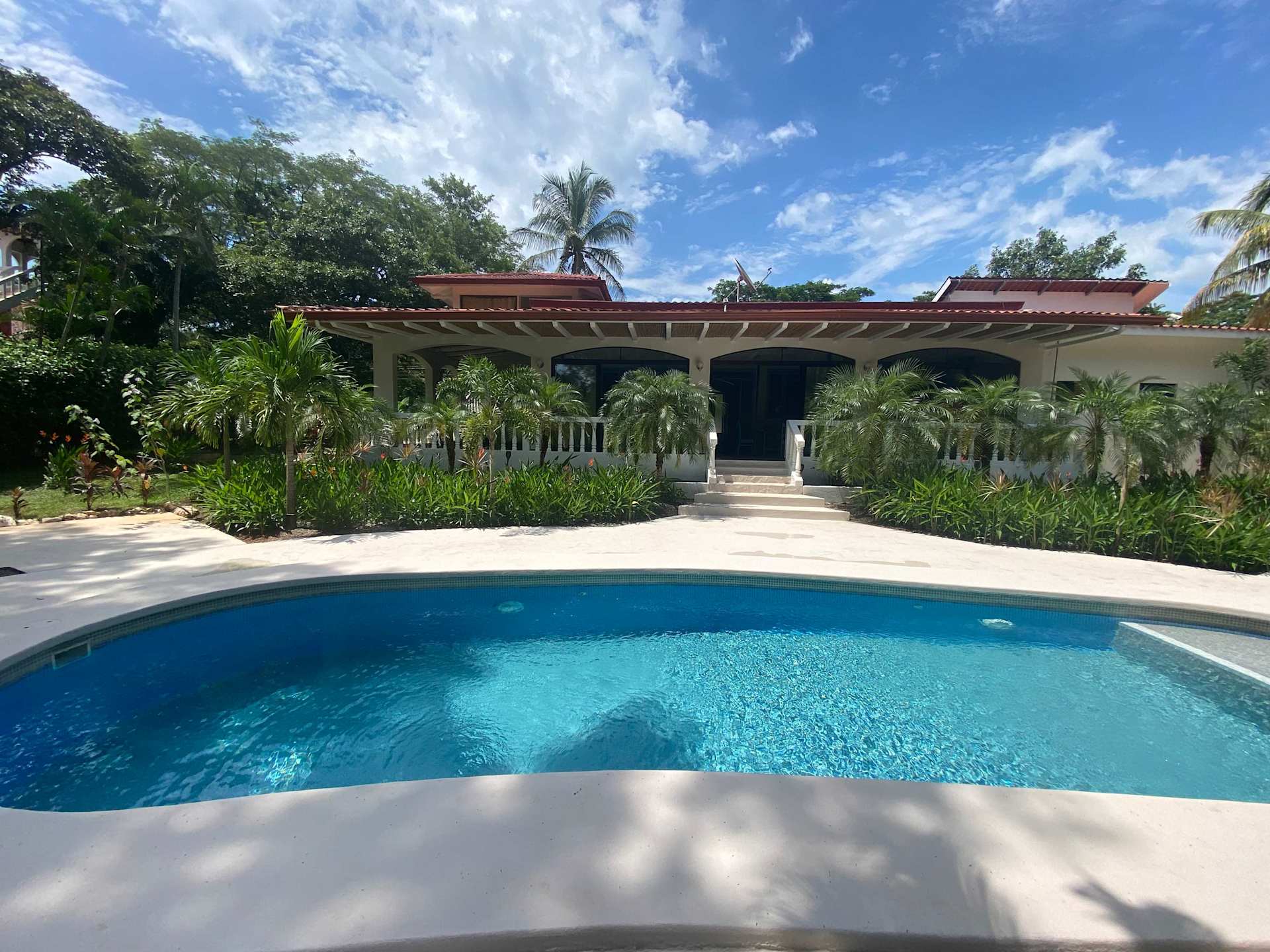 Manta Ray Lodge Flamingo Beach Realty Real Estate for Sale or Rent