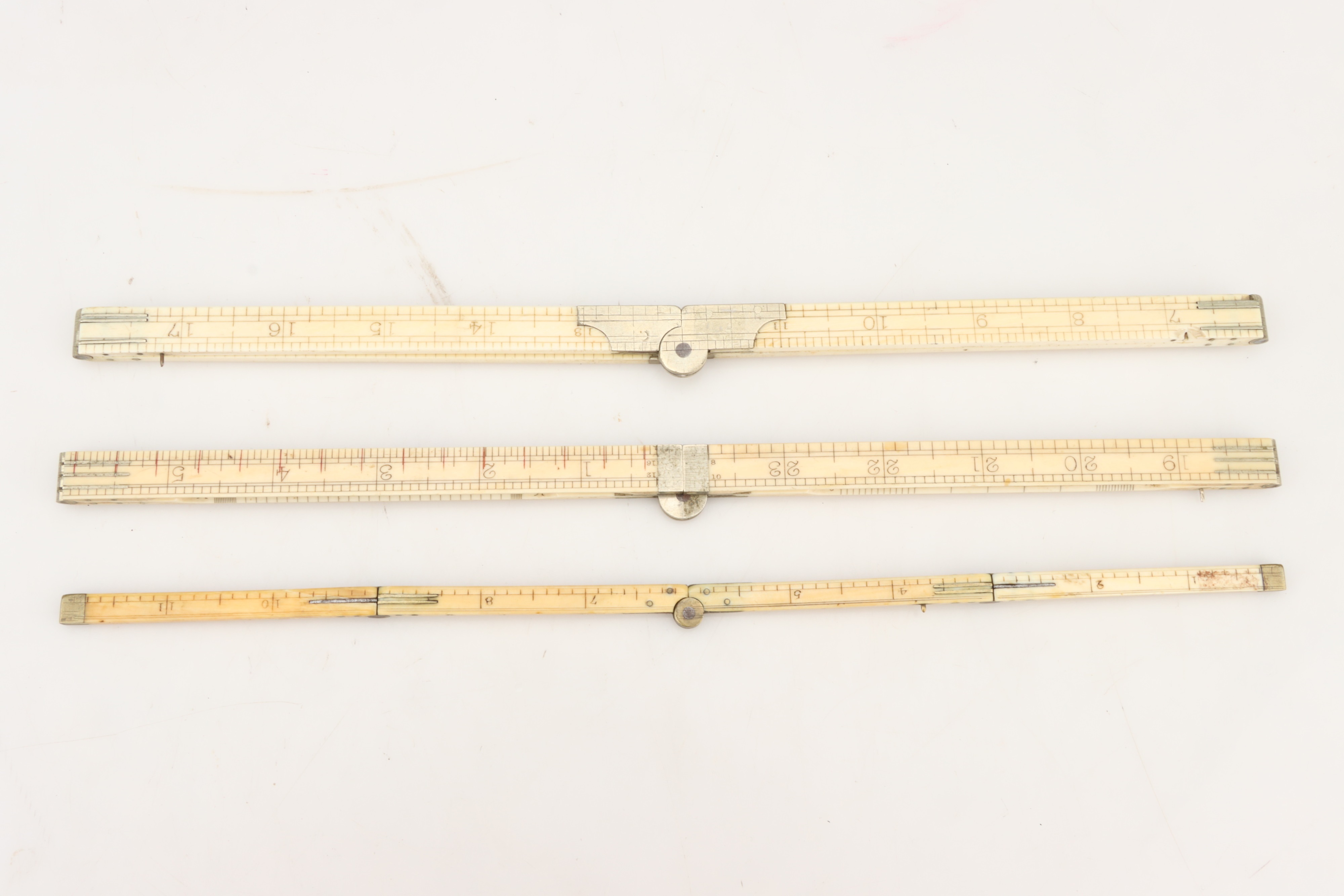 Lot 62 Ivory Folding Rules,