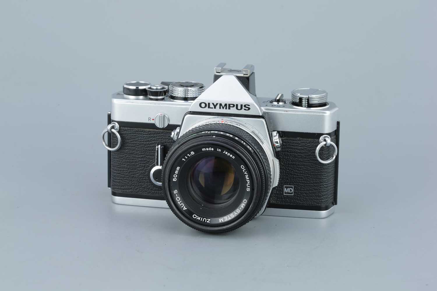 Lot 255 An Olympus OM1 SLR Camera