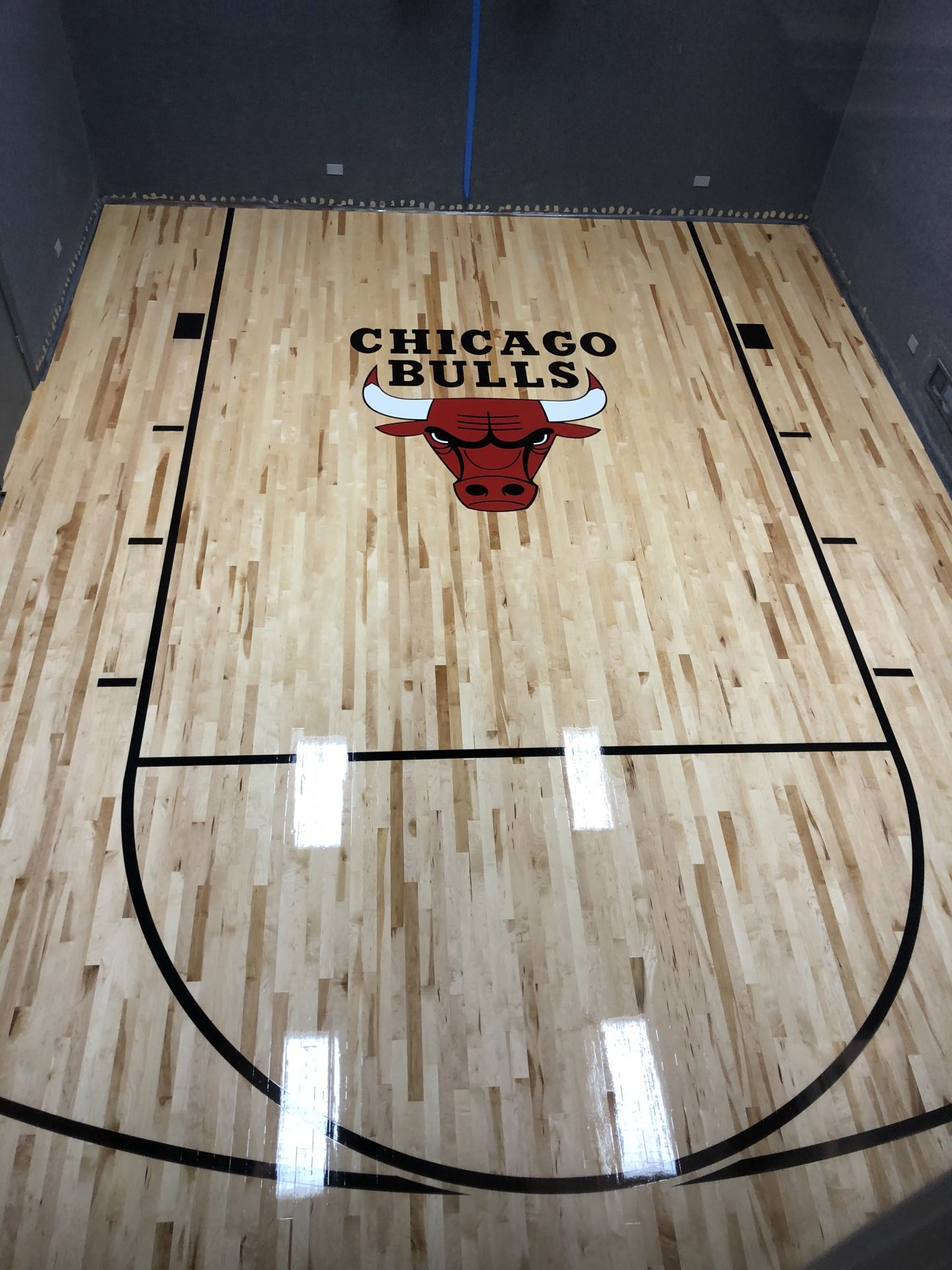 Basketball court with The Chicago Bulls Logo Chicago, FLOORecki LLC