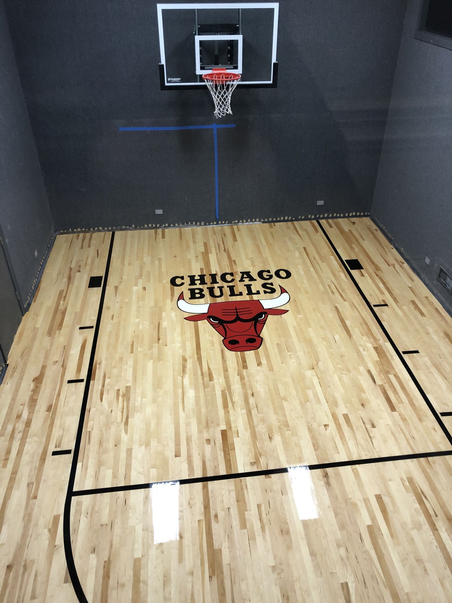 Basketball court with The Chicago Bulls Logo Chicago, FLOORecki LLC