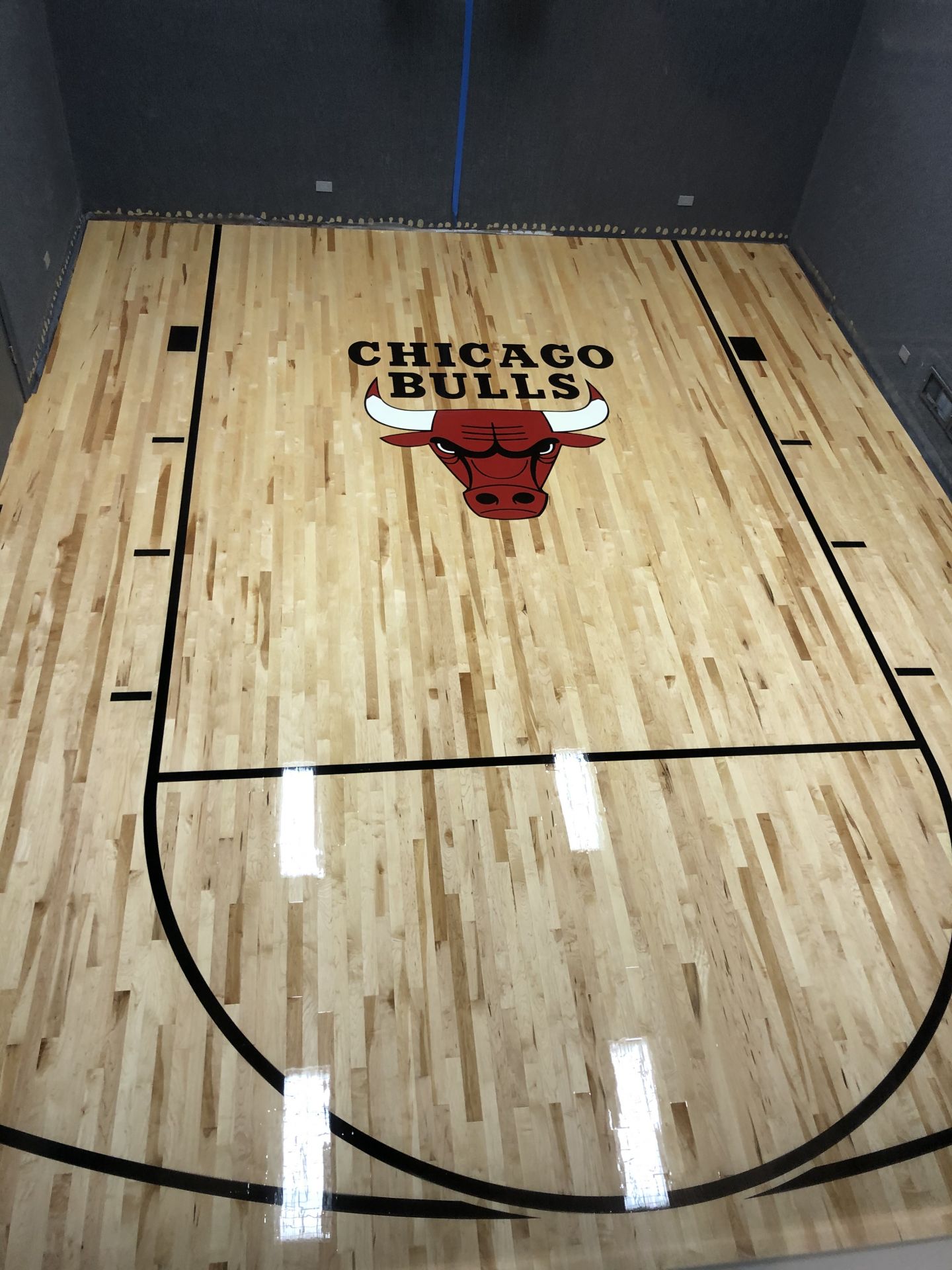 Basketball court with The Chicago Bulls Logo Chicago, FLOORecki LLC