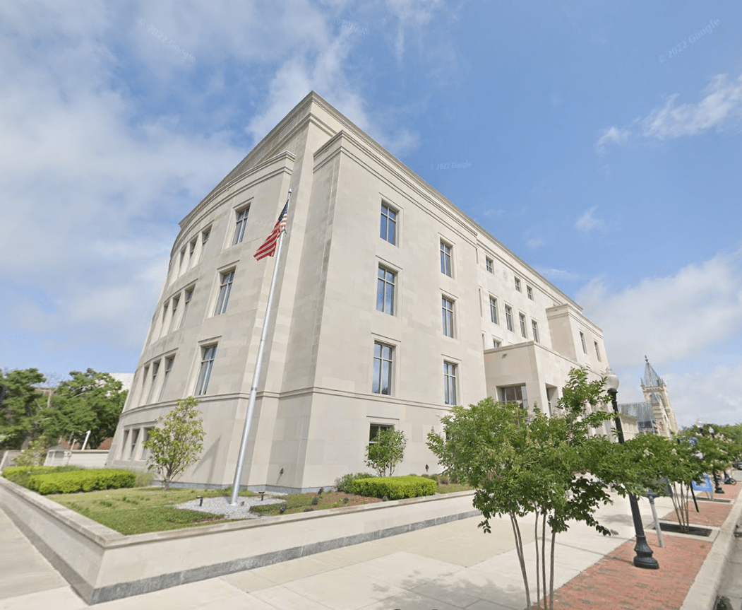 U.S. sues Pensacola furniture store, insurance company, over vaccine