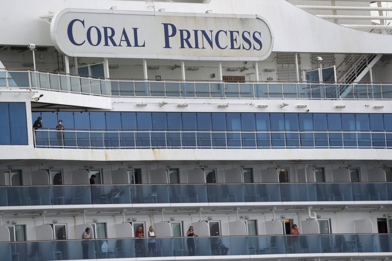 US travelers wait days to leave cruise ship with virus cases