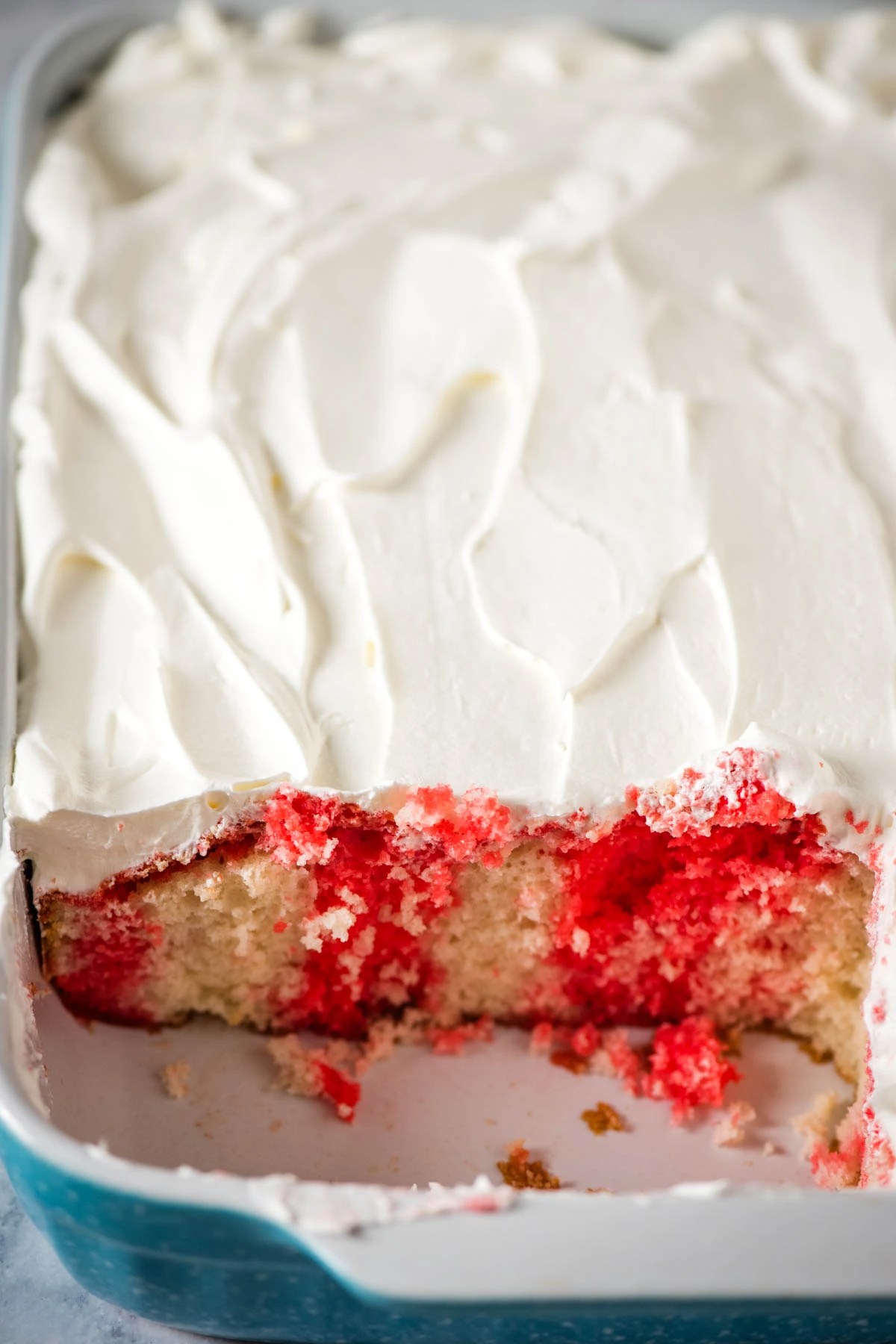 Best Ever Raspberry Poke Cake Recipe with Jello Mix Flour on My Fingers