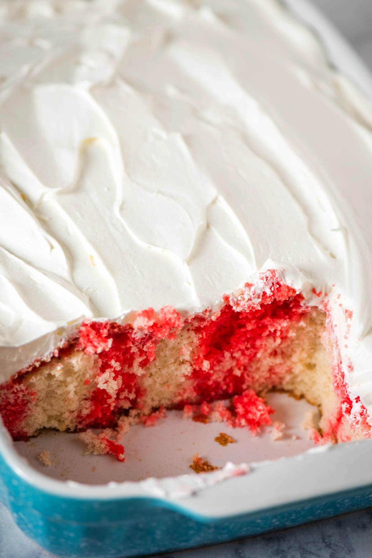 Best Ever Raspberry Poke Cake Recipe with Jello Mix Flour on My Fingers