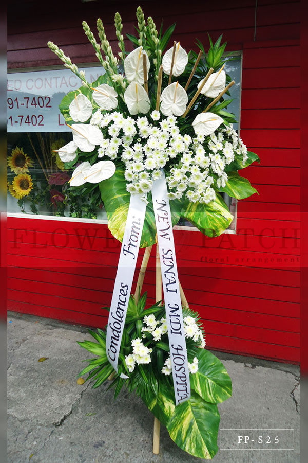 Standing Arrangement of White Anthuriums, Mums & Tuberoses Sympathy