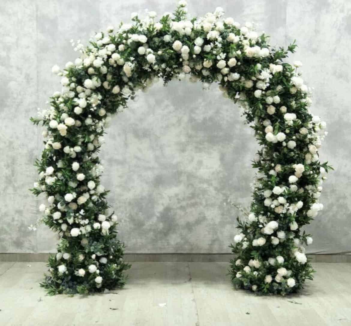 Foliage and white rose wedding arch