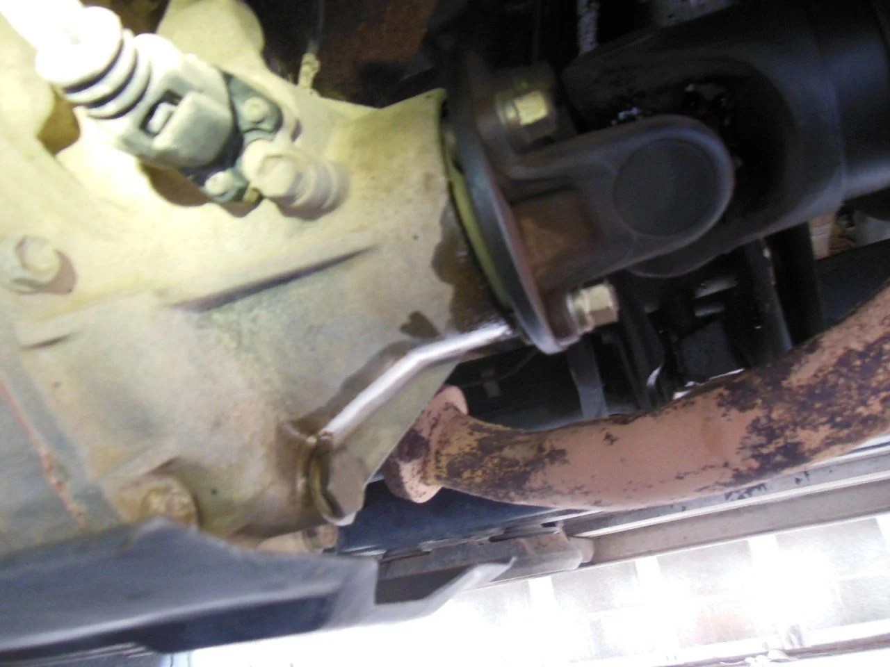 Transfer case rear output shaft oil seal and bearing removal and