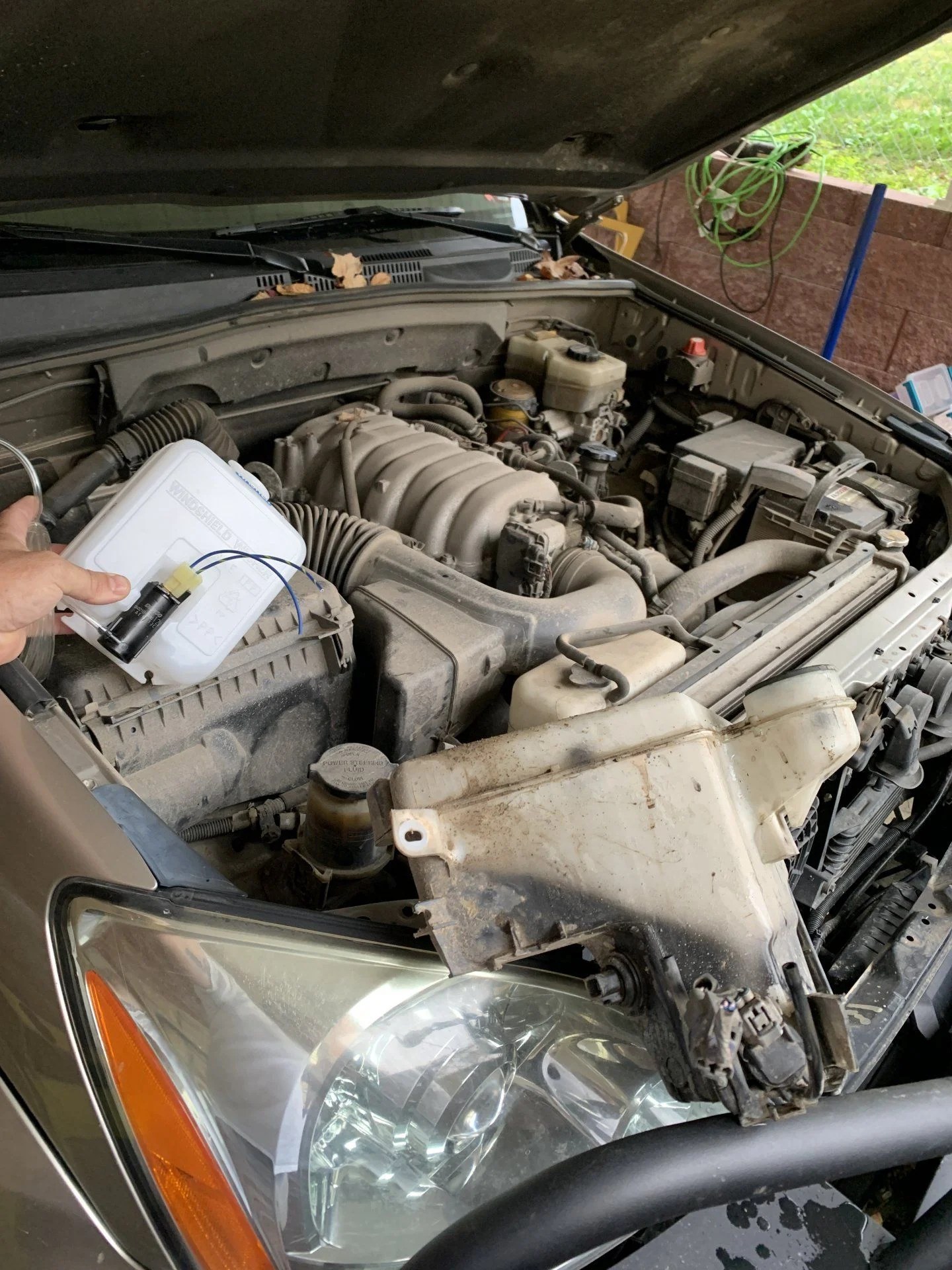 Windshield washer fluid reservoir relocation | IH8MUD.com Forum