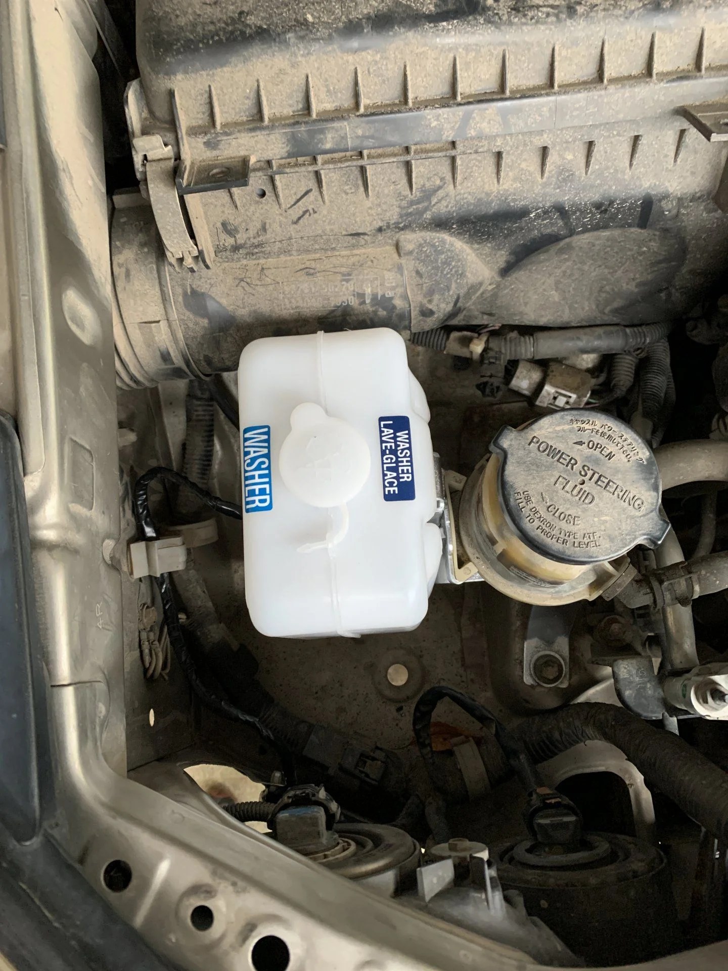 Windshield washer fluid reservoir relocation | IH8MUD Forum