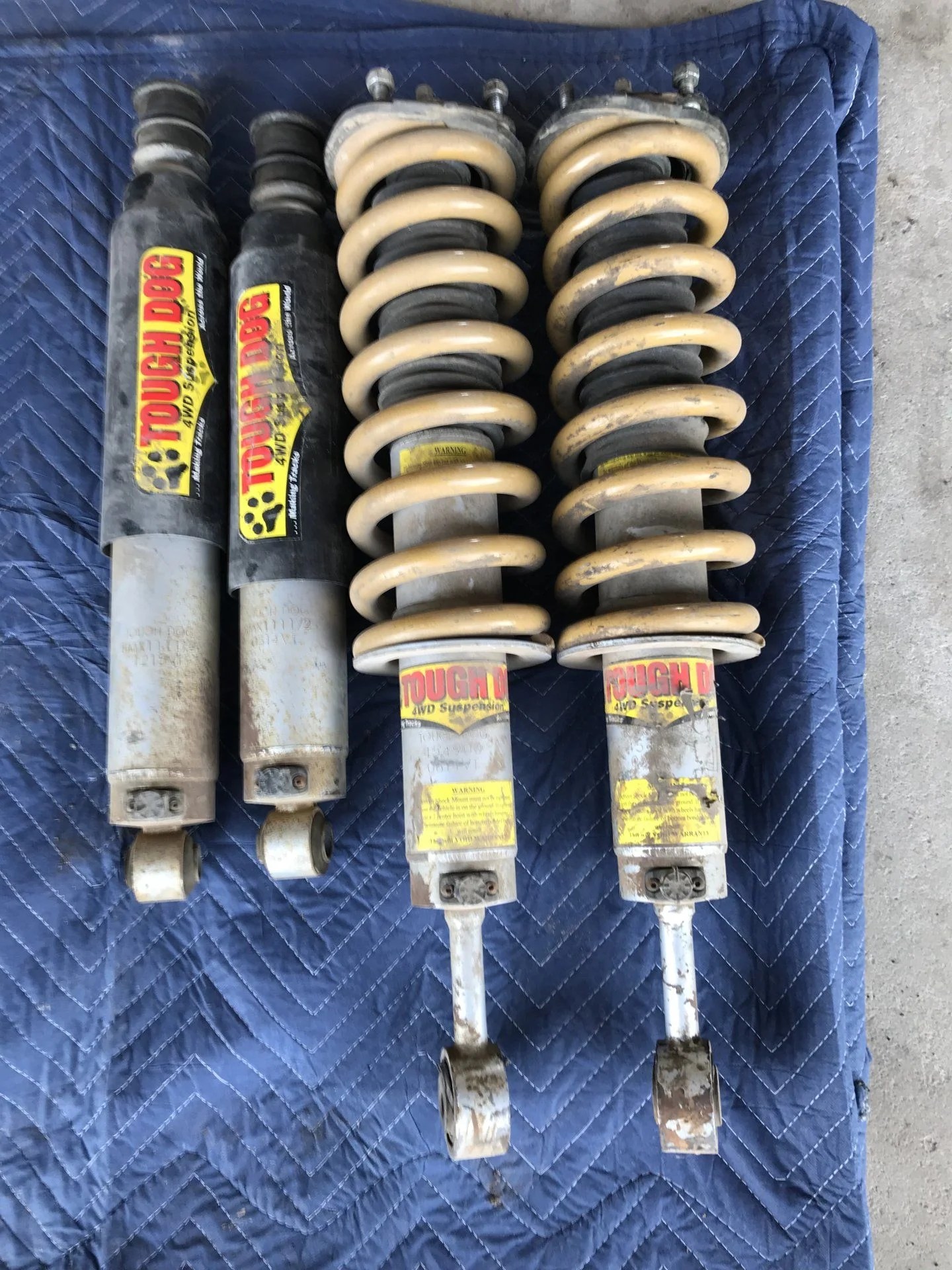 SOLD 200 series Tough Dog 53 mm 9 way adjustable rear shocks and