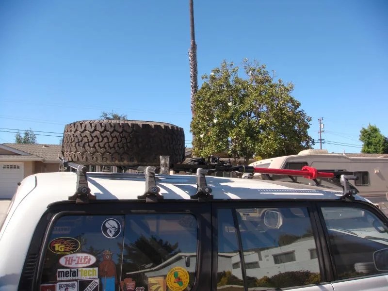 Cheap alternative to a roof rack without the rack. IH8MUD Forum