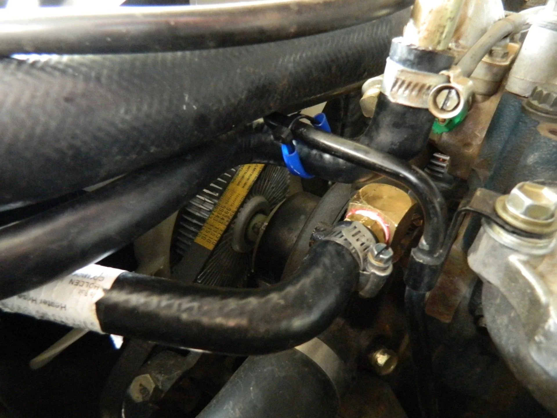 Camping shower, heated from the vehicle radiator coolant system