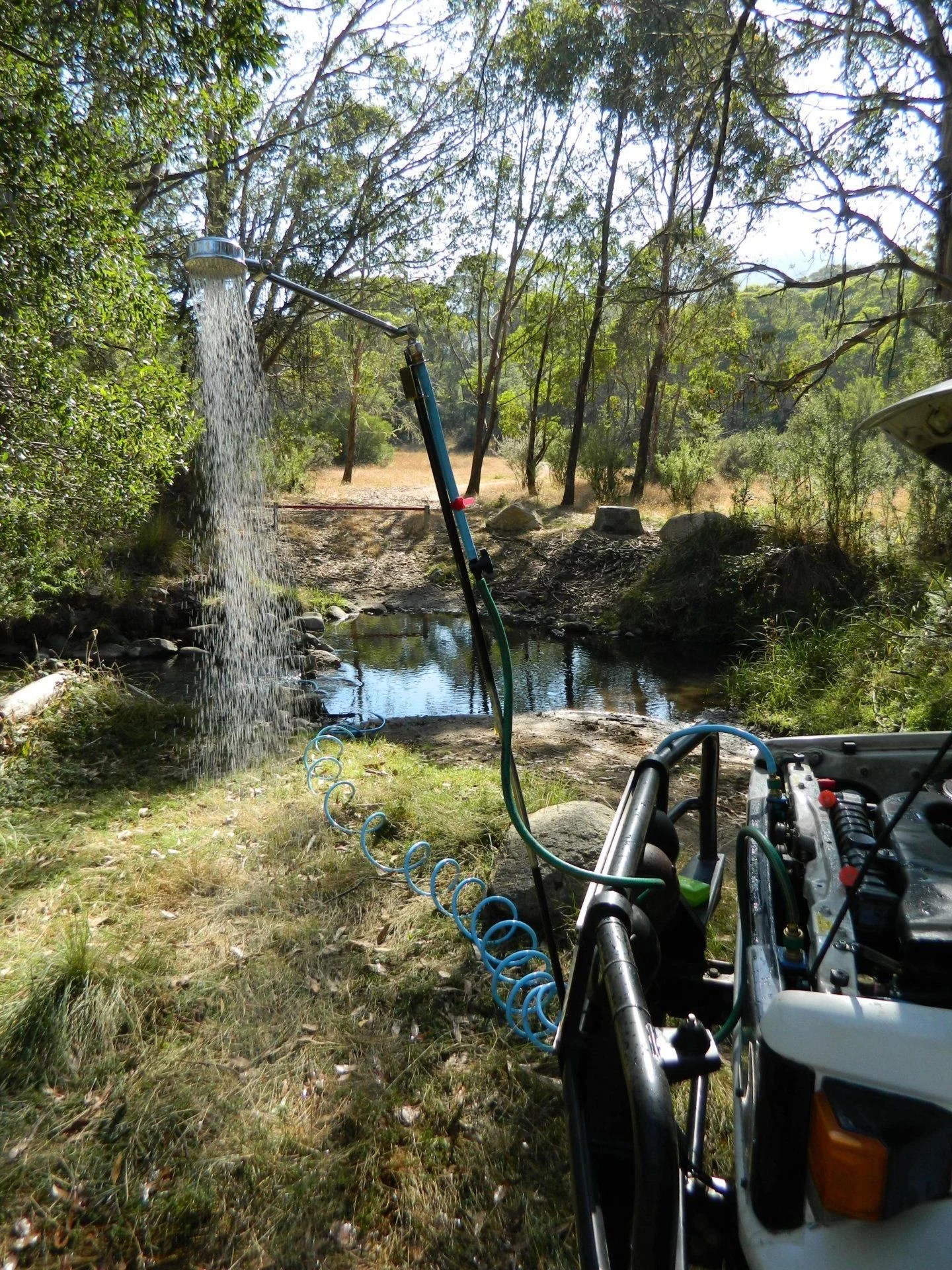 Camping shower, heated from the vehicle radiator coolant system. Page