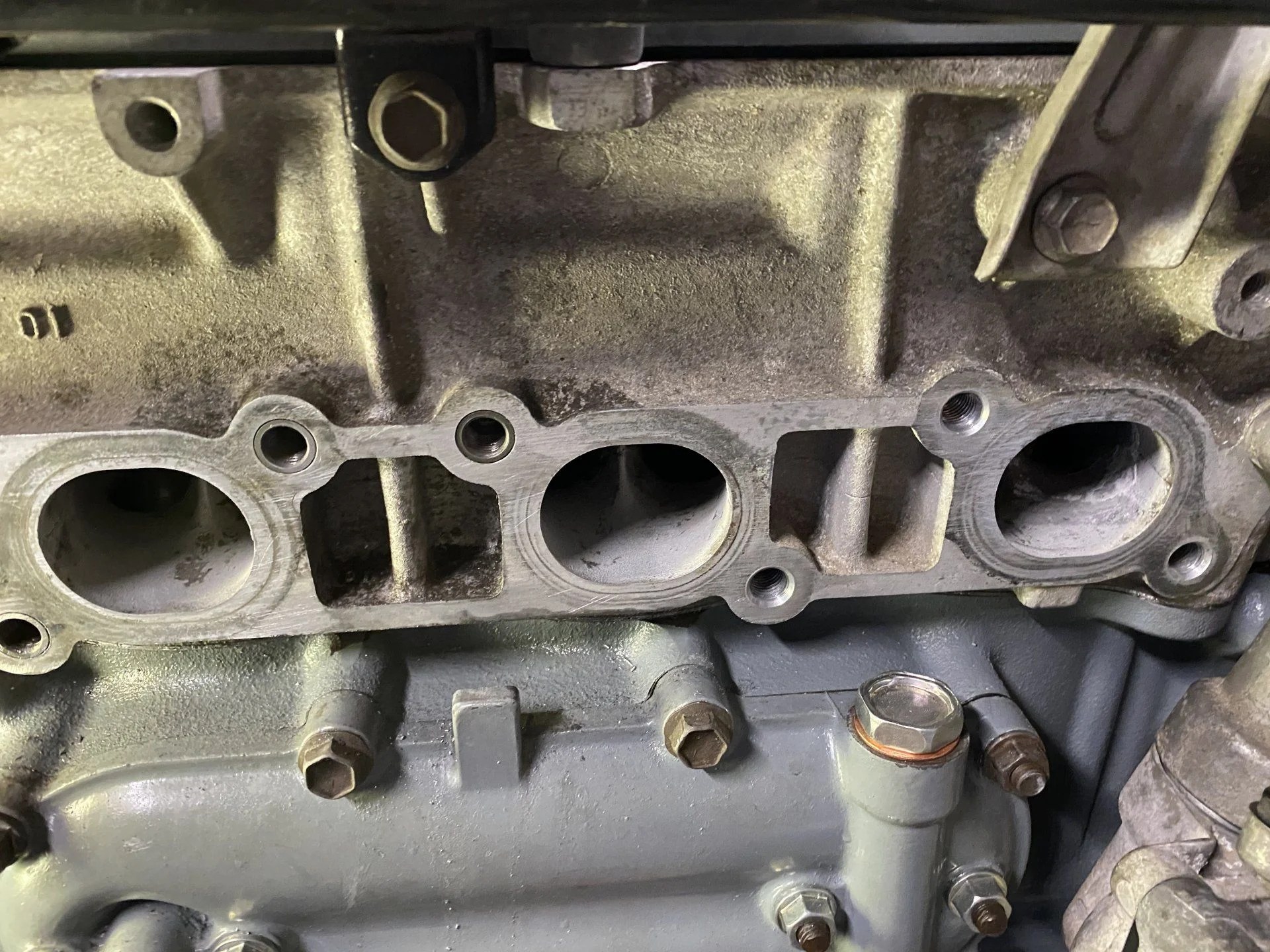 Stripped exhaust manifold hole in head need some advice IH8MUD Forum