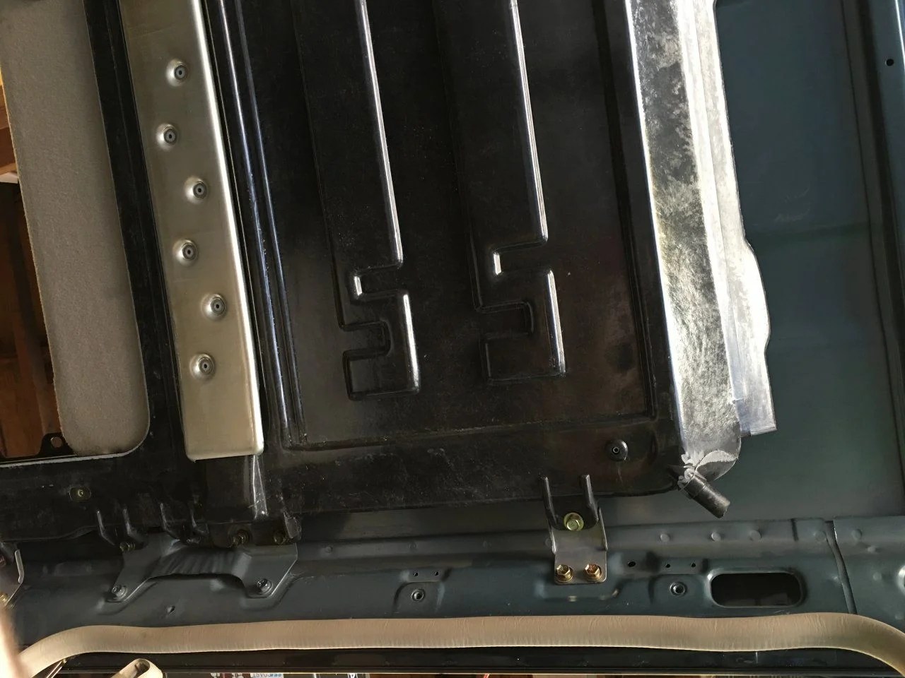 Headliner and sunroof pulled to fix leaks if anyone wants pics