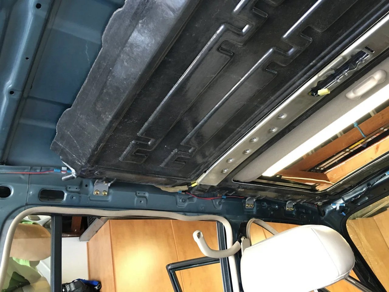 Headliner and sunroof pulled to fix leaks if anyone wants pics