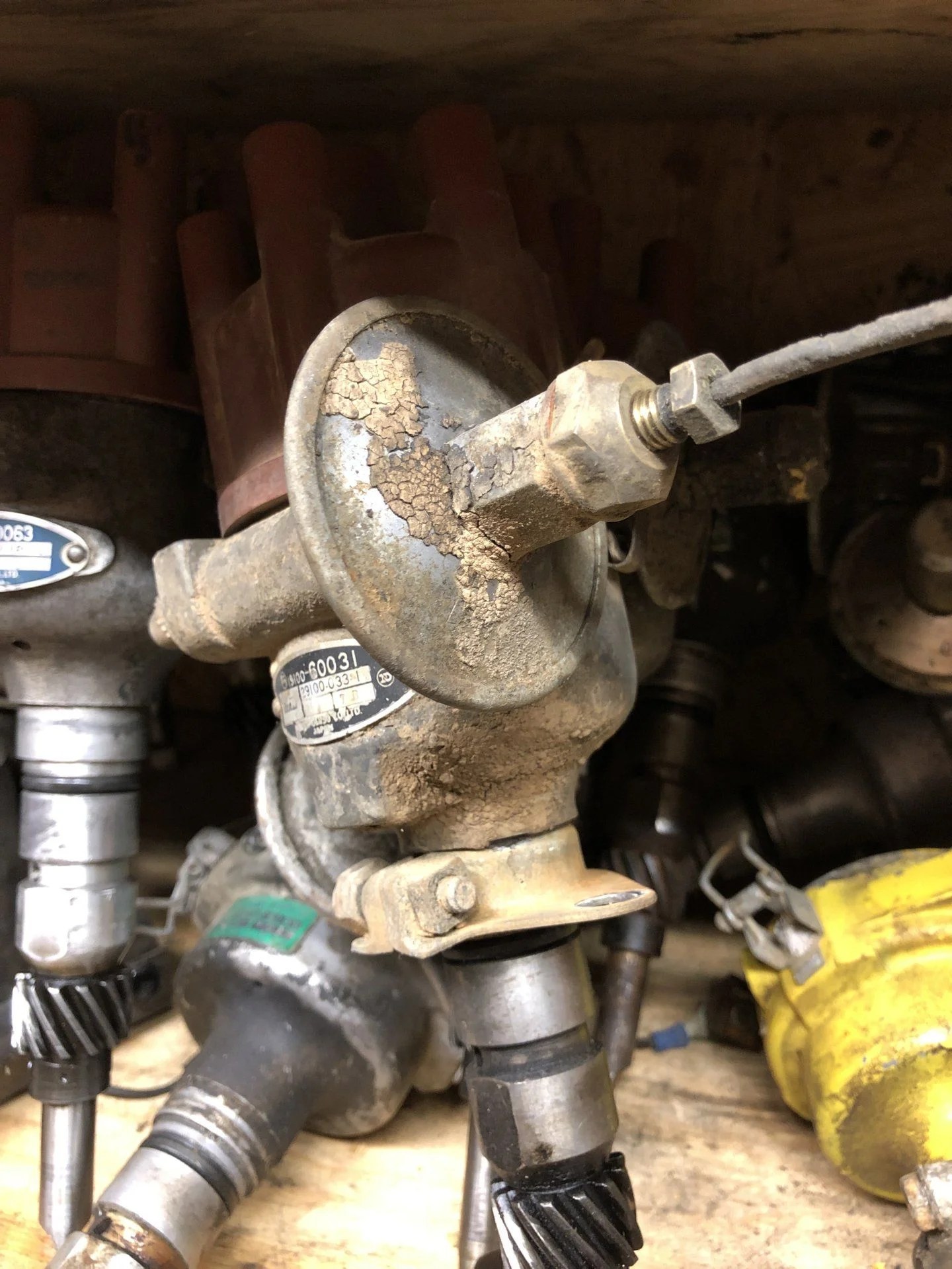 Wanted Early Distributor Vacuum Advance Fitting with Several Inches