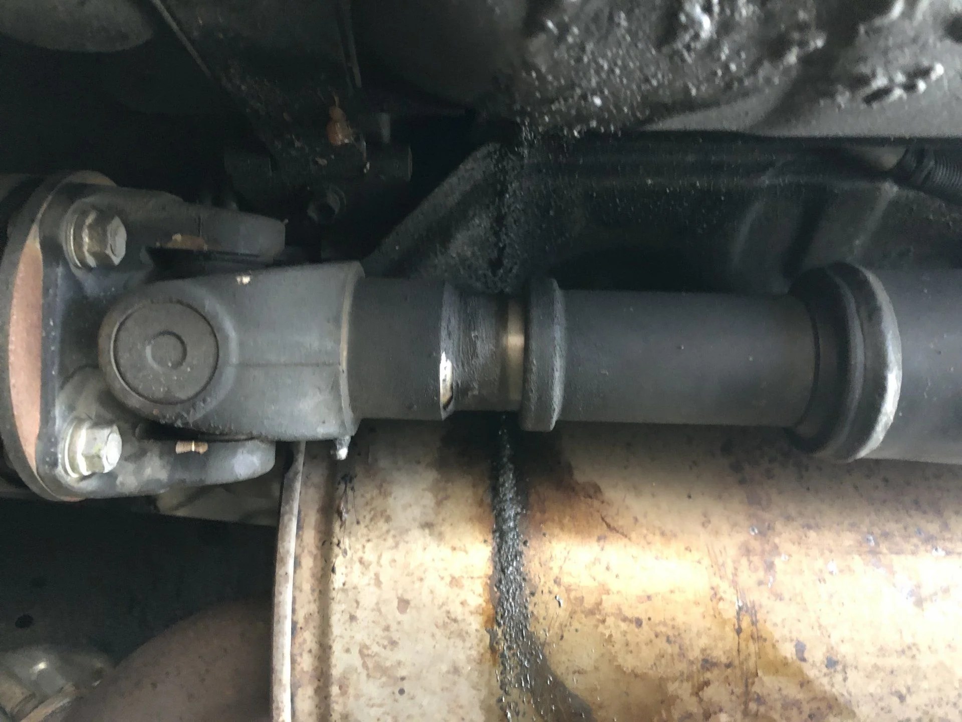 Drive shaft throwing off grease, overfill or something wrong? IH8MUD
