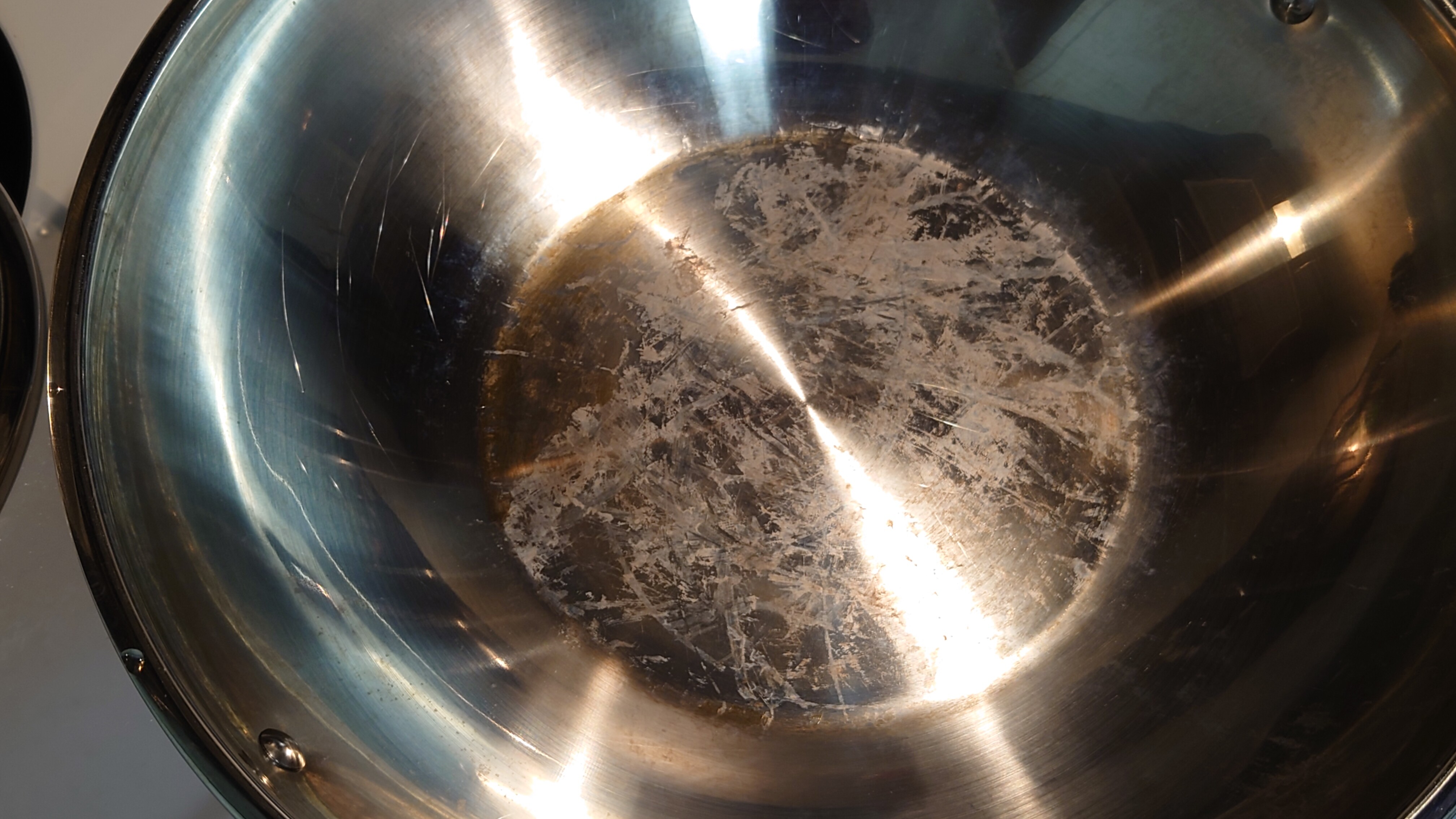How to remove burnt oil from a stainless steel pan/wok Food & Drink