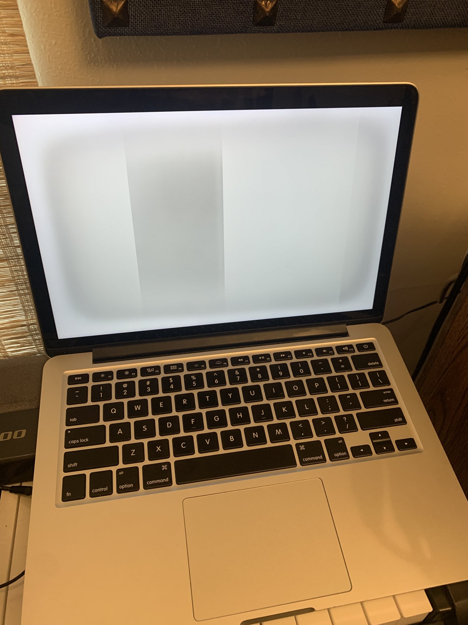 HELP! Macbook shows white screen with black ring! MacRumors Forums