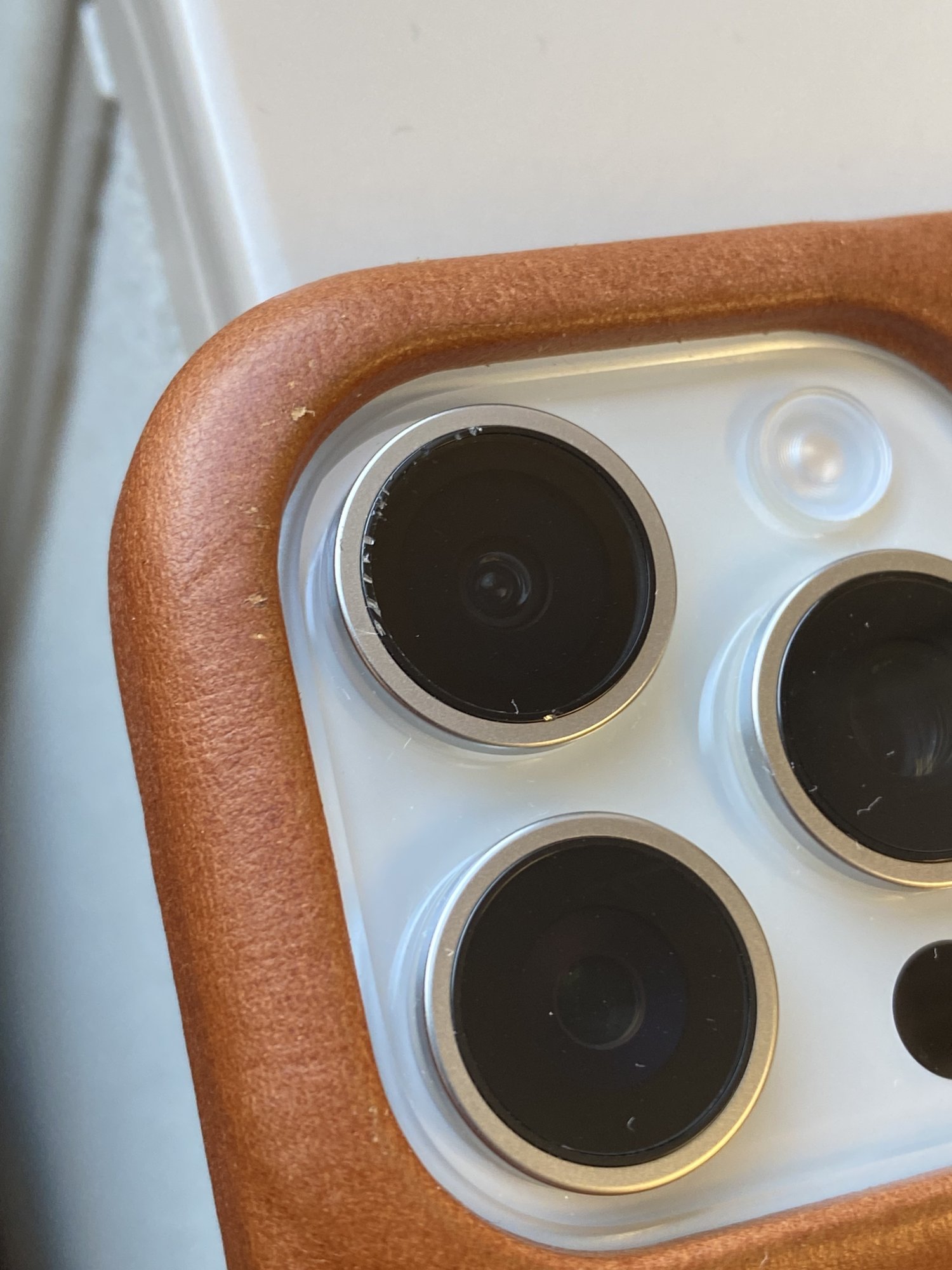 New iPhone, scratched a rear camera lens by accidental drop; AppleCare+