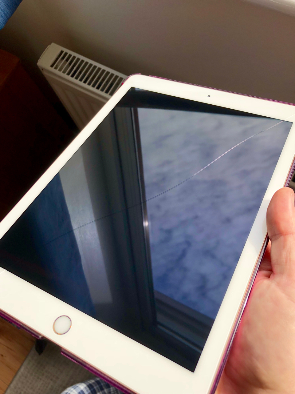 *Click!* and then hairline crack across screen ( MacRumors Forums