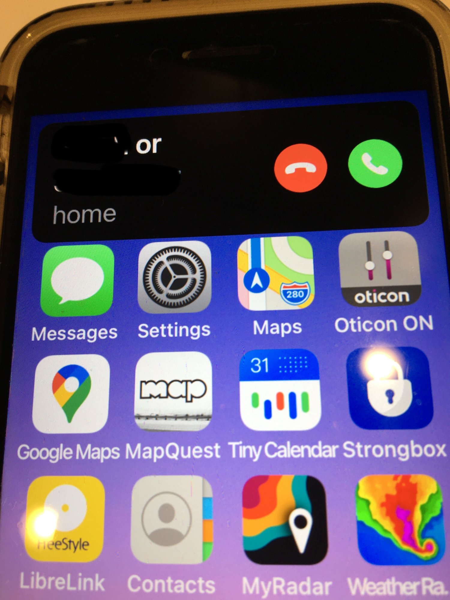 When my iPhone rings it more than sometimes shows a horizontal icon at