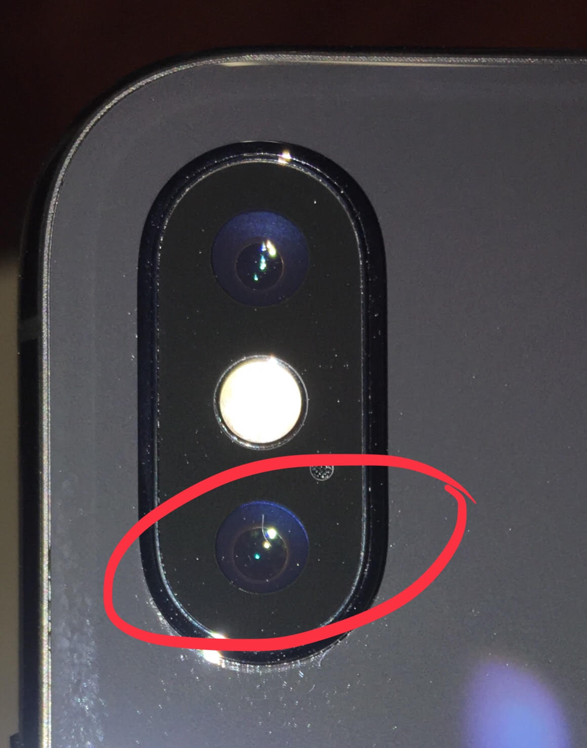 freakin' hair on camera lens iPhone X MacRumors Forums