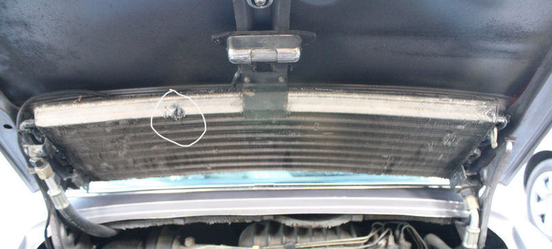 Is there any fixing this hole in my AC condenser? Pelican Parts Forums