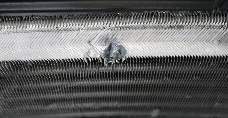 Is there any fixing this hole in my AC condenser? Pelican Parts Forums