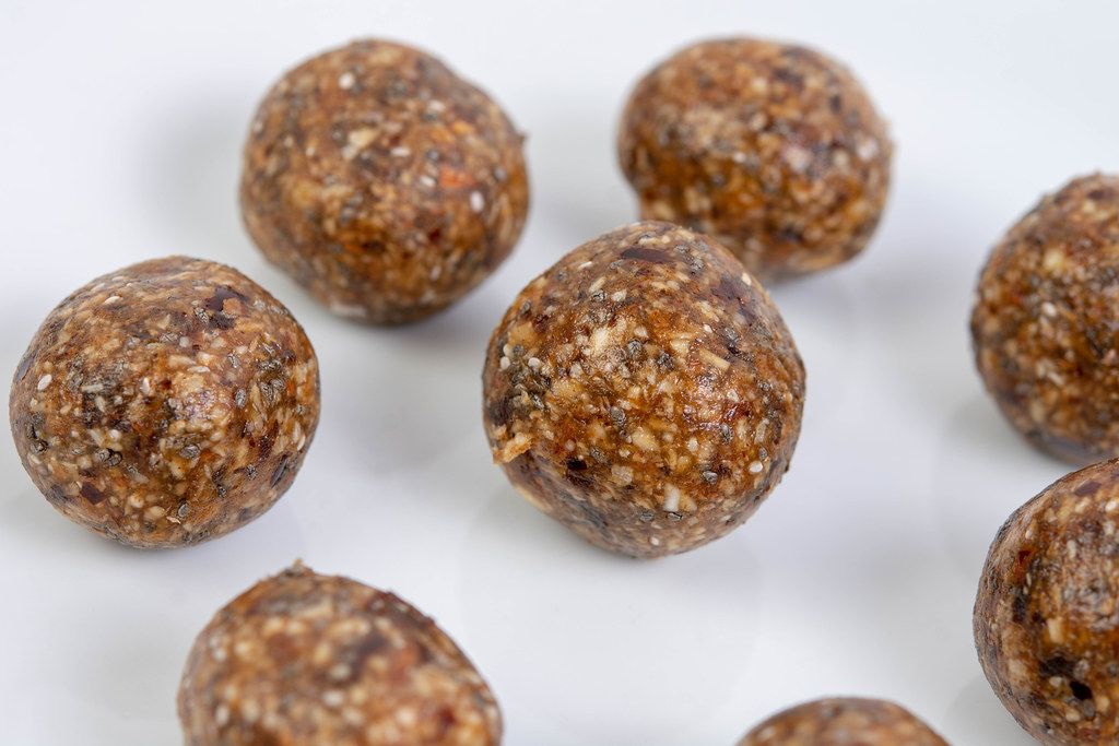 Dates and Peanut Butter energy balls in the Coconut (Flip 2019