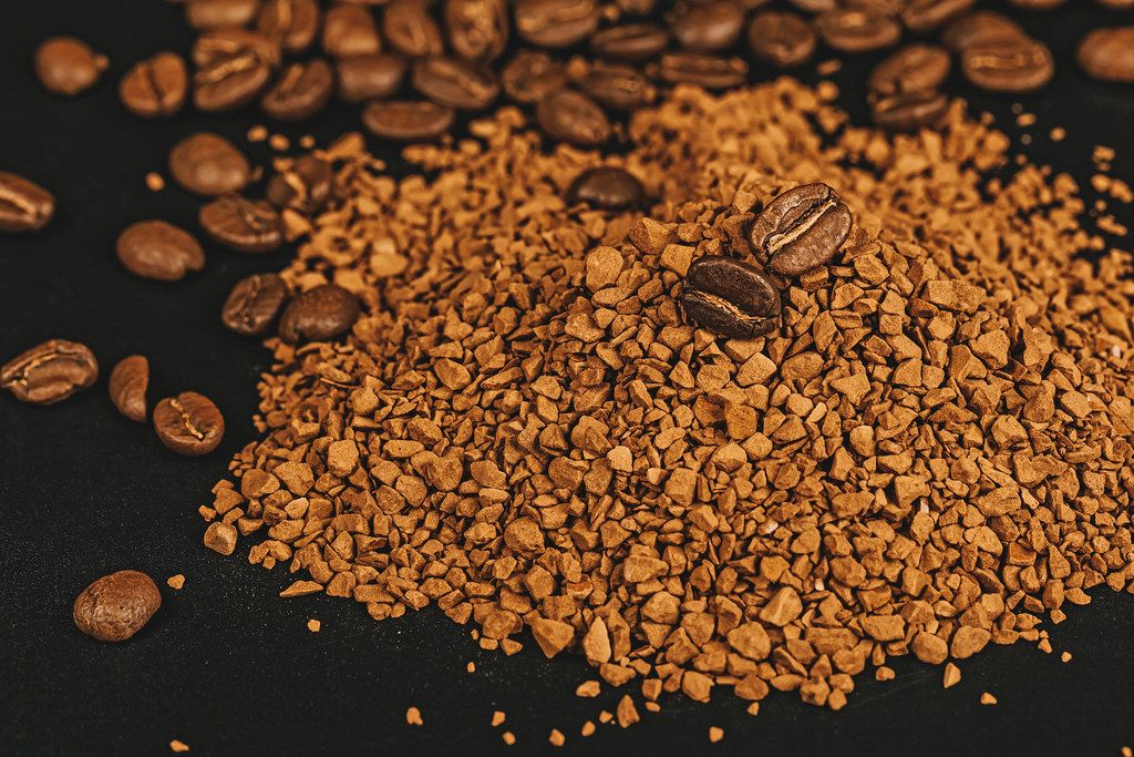 Coffee variation powdered, instant coffee and beans in spoons