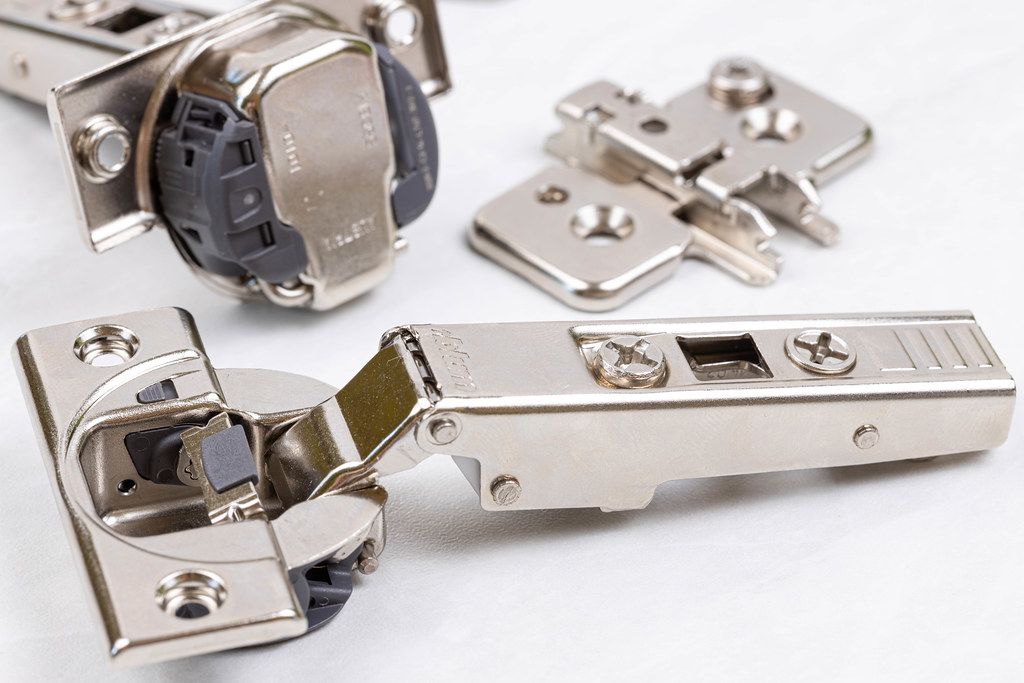 Metal Blum Hinges with slowmotion system ready for mounting Creative