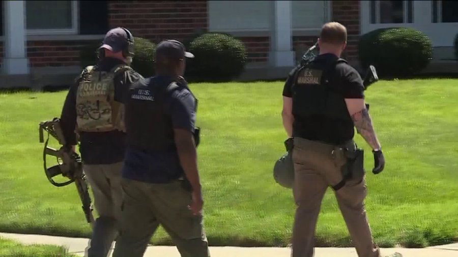 Armed suspect in barricaded standoff with officers in north St. Louis