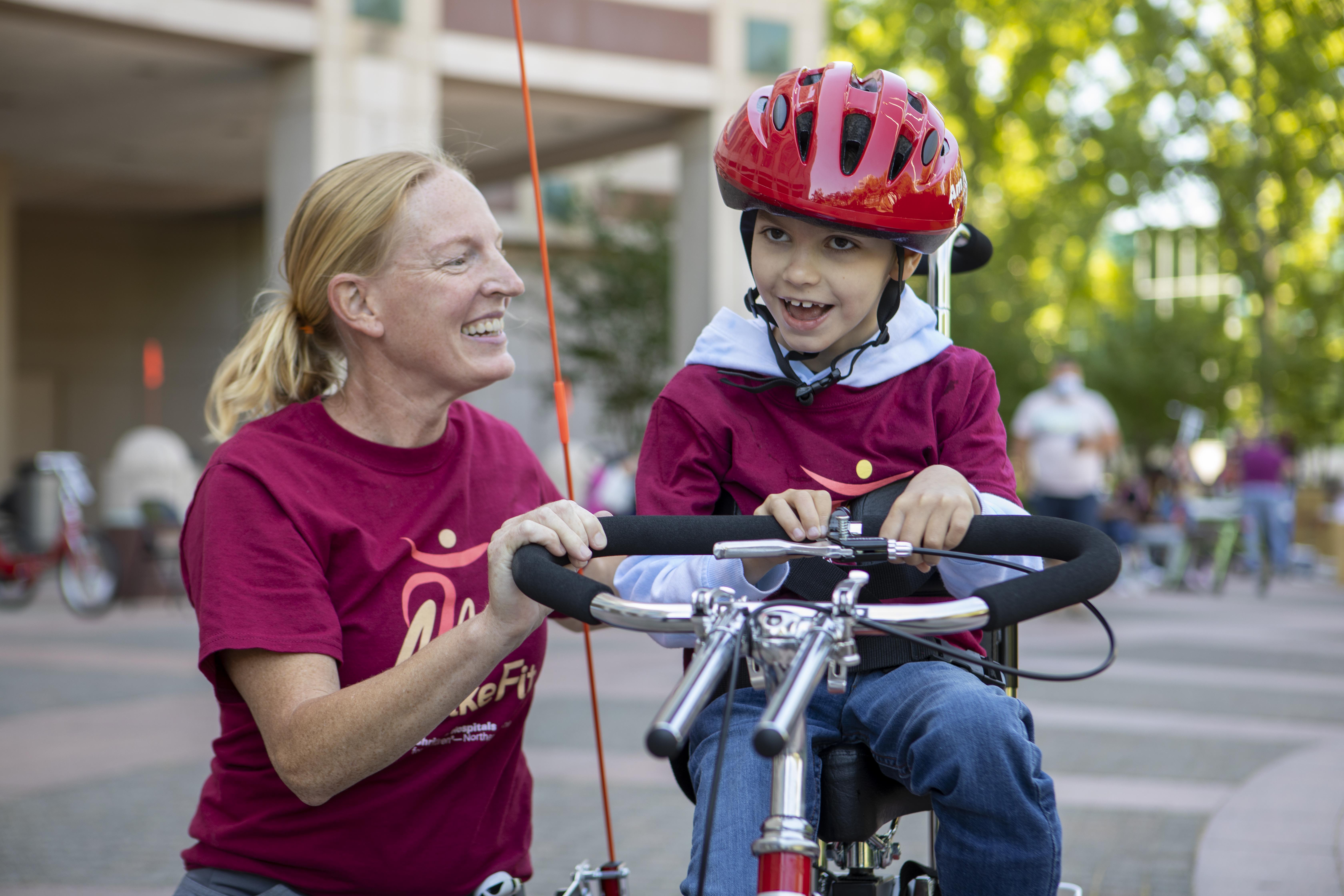 Shriners staff, volunteers build 25 custom bikes for children with