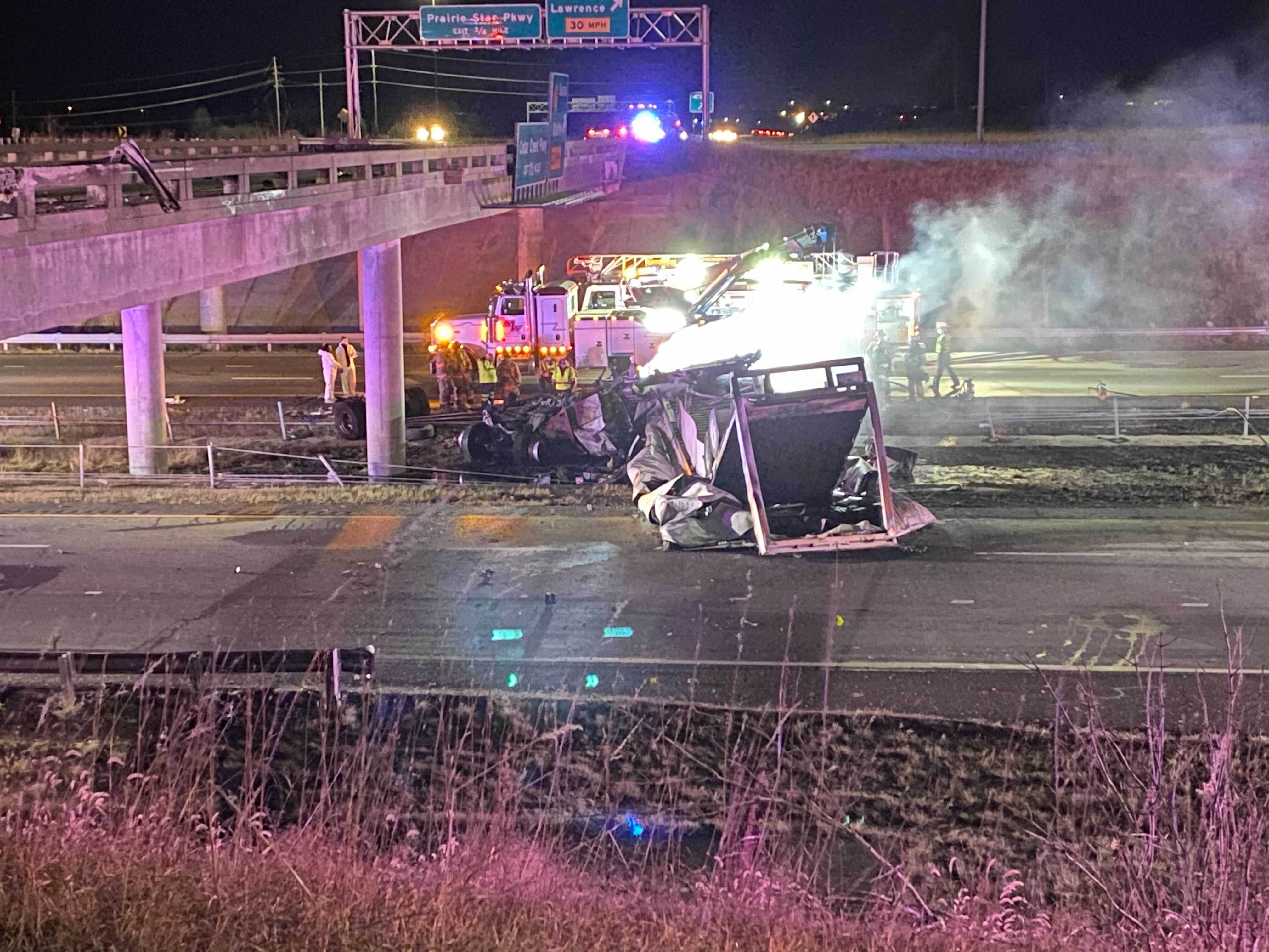 Lanes still closed 1 dead after FedEx truck falls from K7 onto K10
