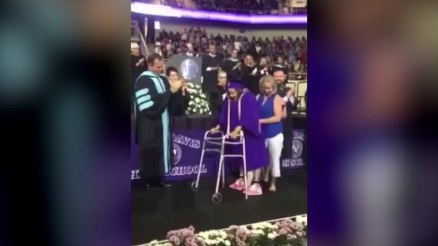 Cheerleader paralyzed in gymnastics accident walks at high school graduation Fox 59