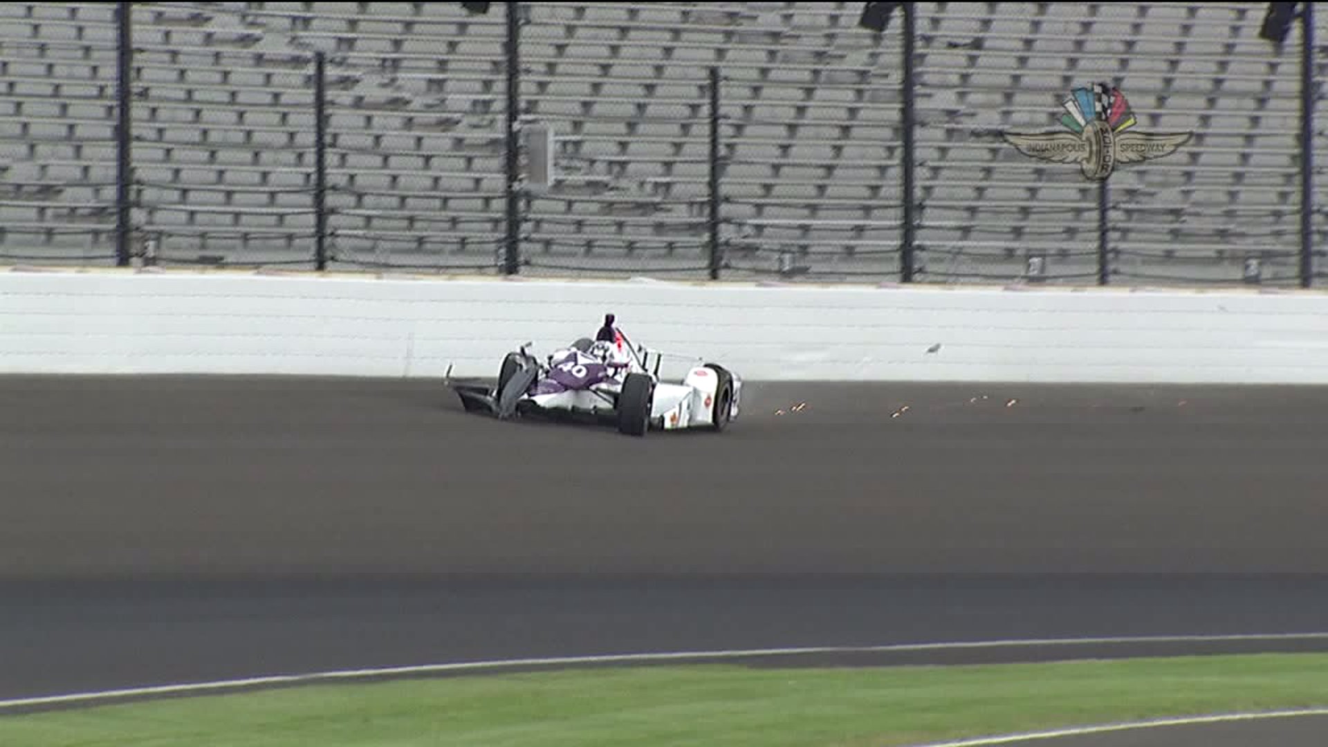 Rookie Zach Veach gets out of car on his own following crash Friday at