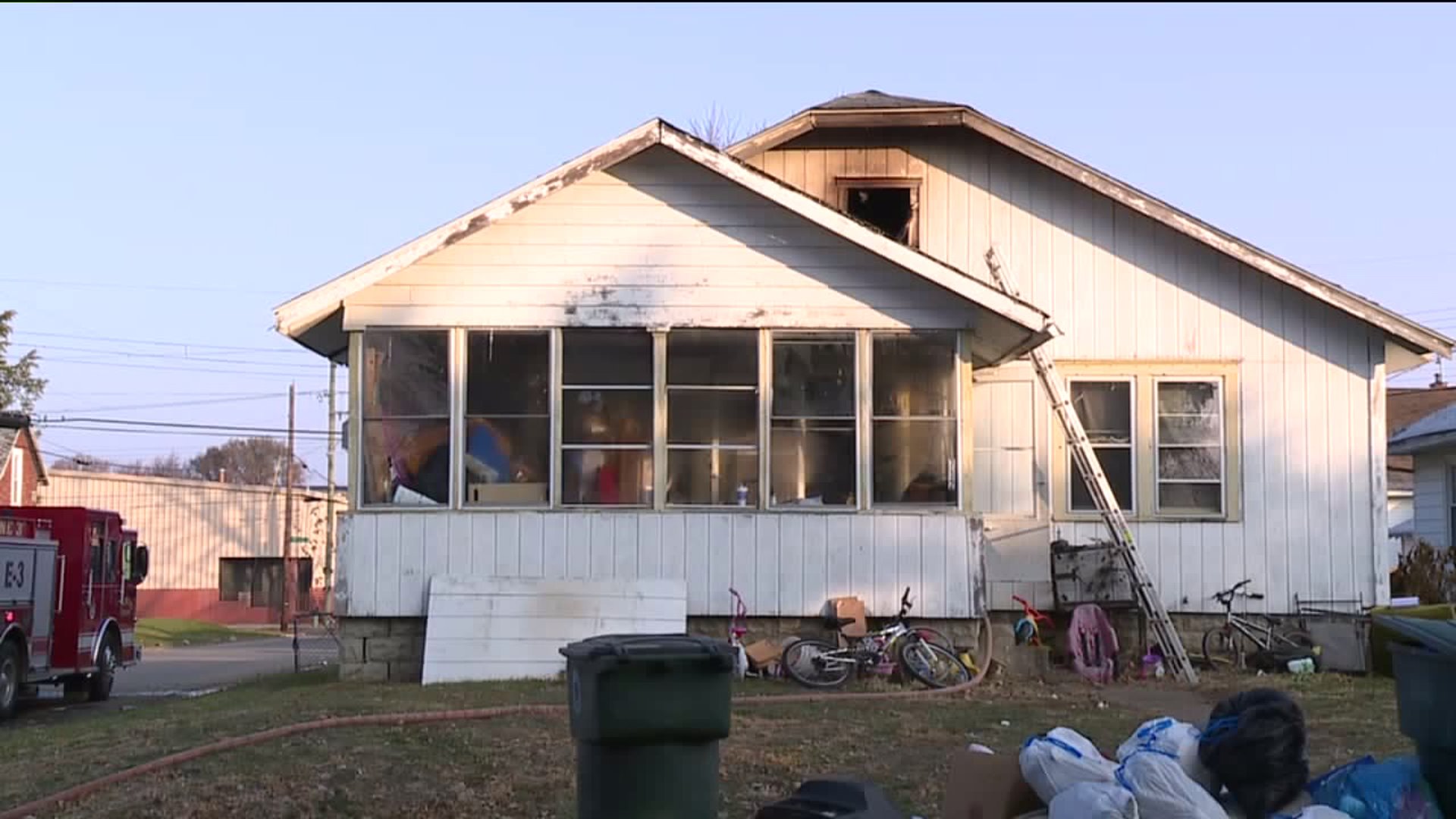Muncie man pushed fiancée out of attic window to safety before dying in