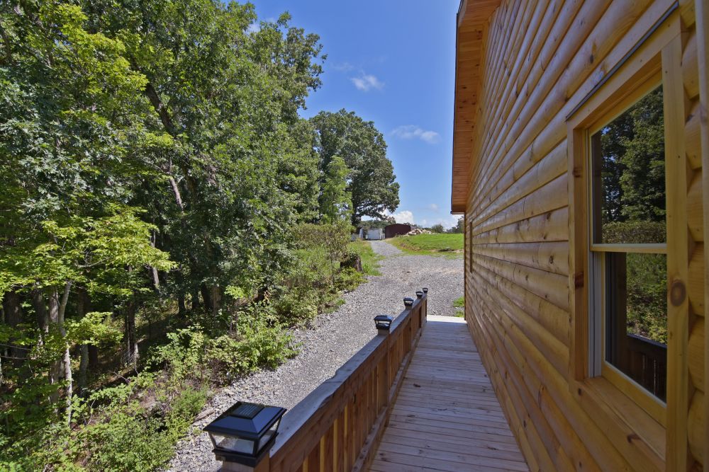 LOG CABIN RETREAT Foxfire Realty