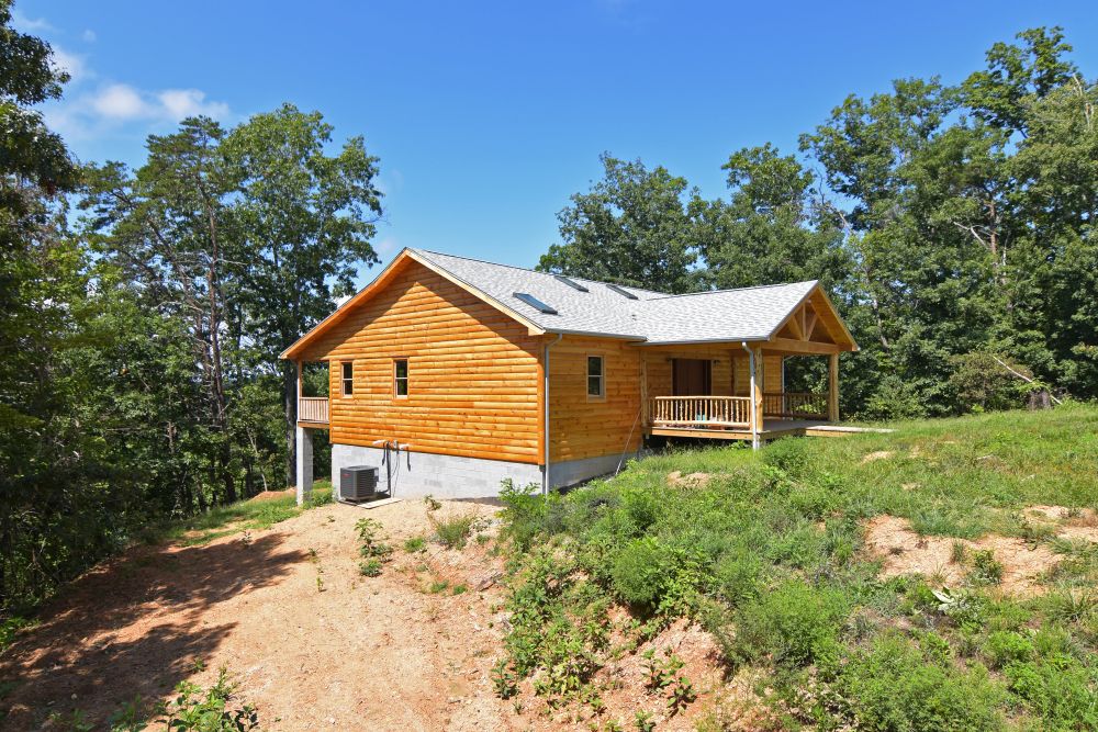 LOG CABIN RETREAT Foxfire Realty