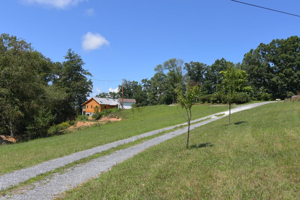 LOG CABIN RETREAT Foxfire Realty