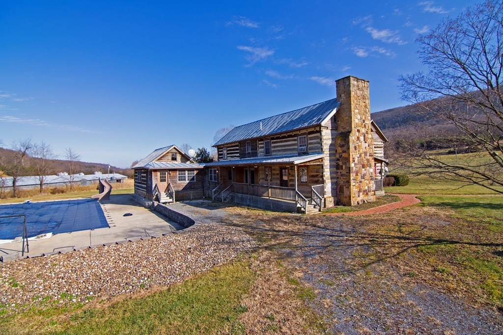 HISTORIC LOG HOME and FARM on SOUTH MILL CREEK Foxfire Realty